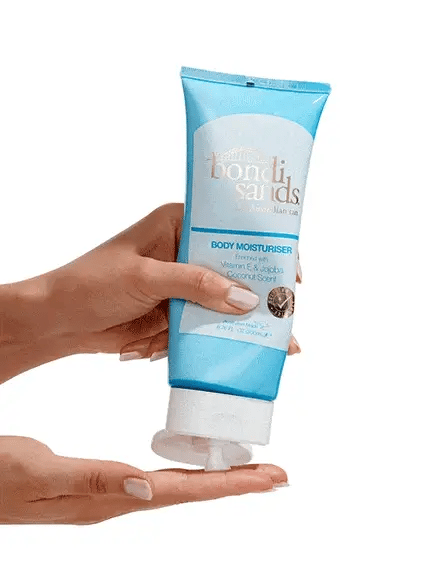 Bondi Sands Coconut Body Moisturiser bottle being squeezed to show lightweight, hydrating lotion texture in animated GIF