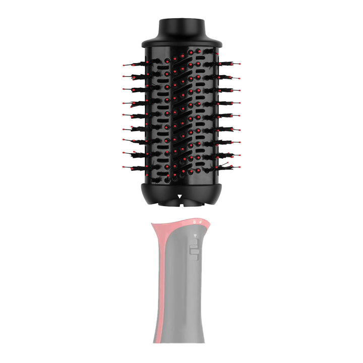 Revlon 61mm brush shown connected to Volumiser PLUS power handle — close-up of detachable locking design and secure fit