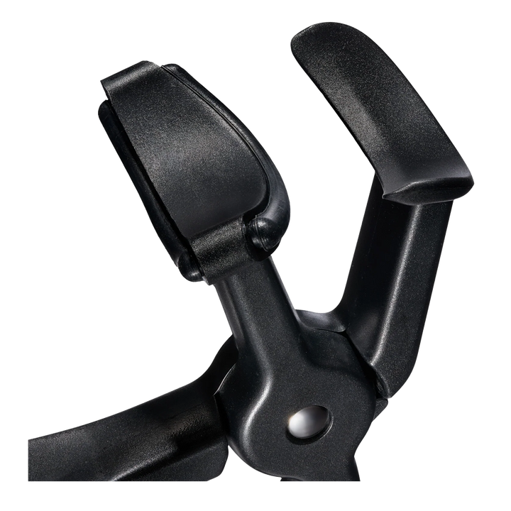 Close-up of Revlon Comfort + Control Lash Curler silicone lash pad showing soft, no-pinch cushioning