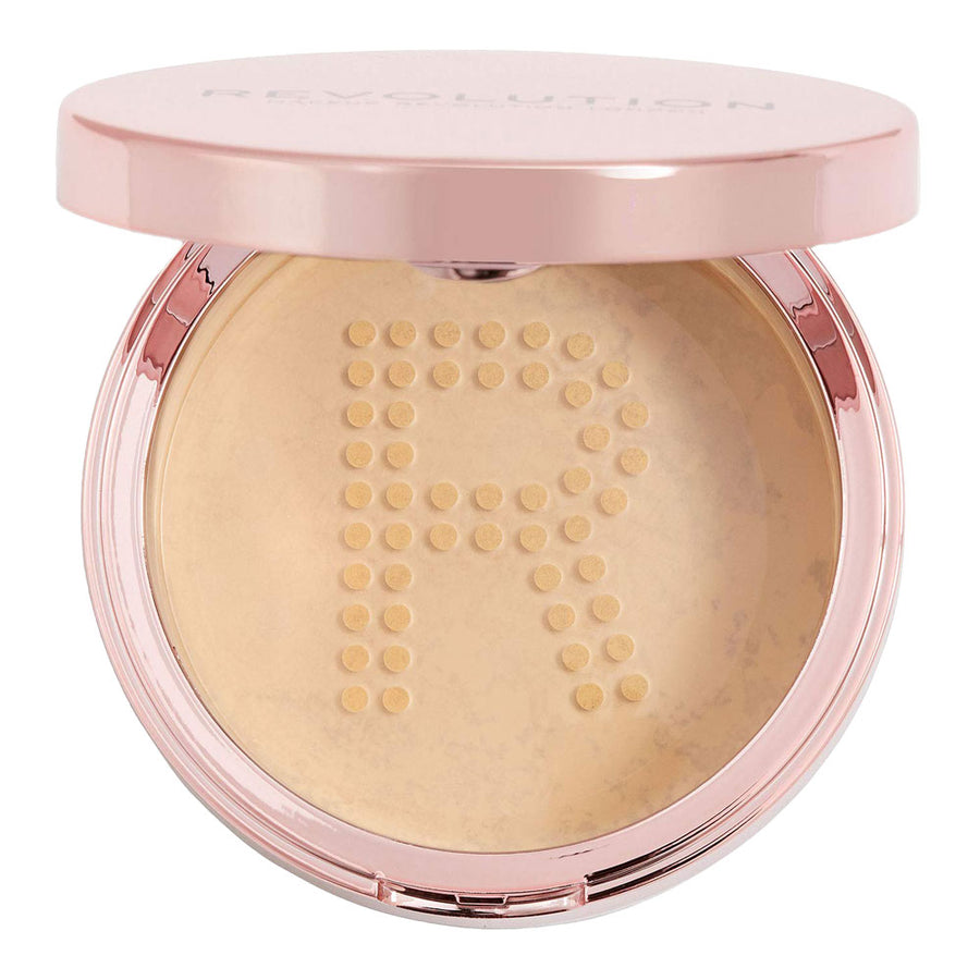Revolution Conceal and Fix Setting Powder Medium Yellow open showing powder texture