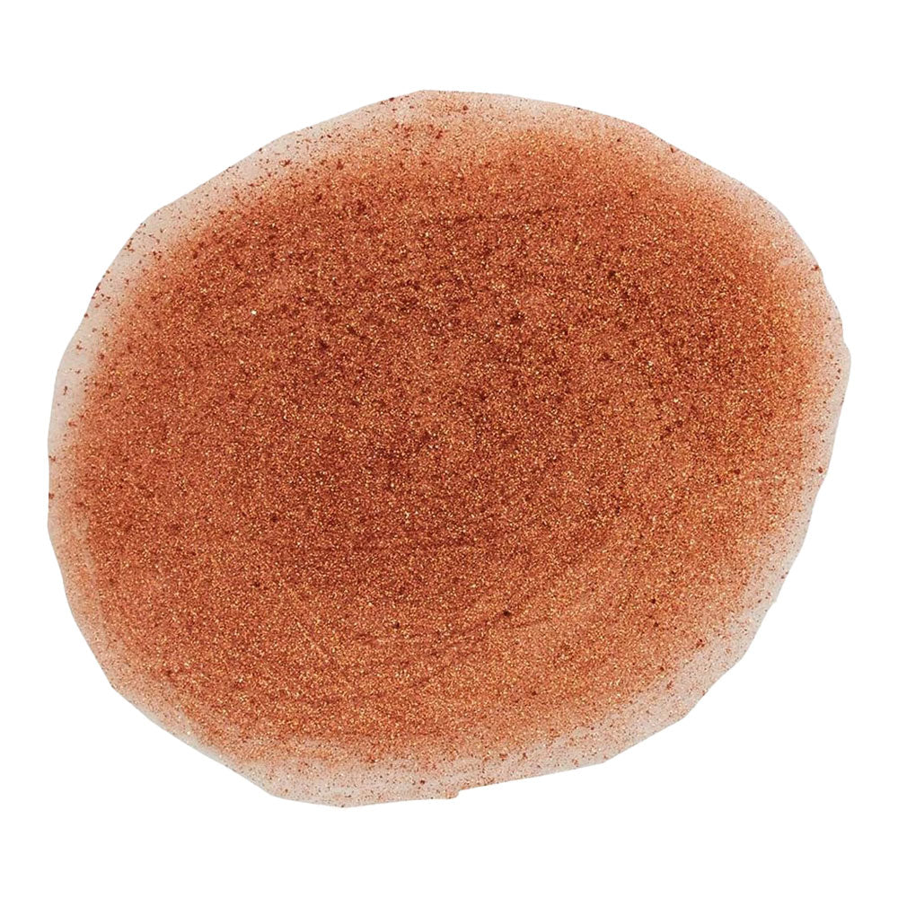 Revolution Glow Illuminating Face and Body Spray Timeless Bronze swatch showing warm bronze finish